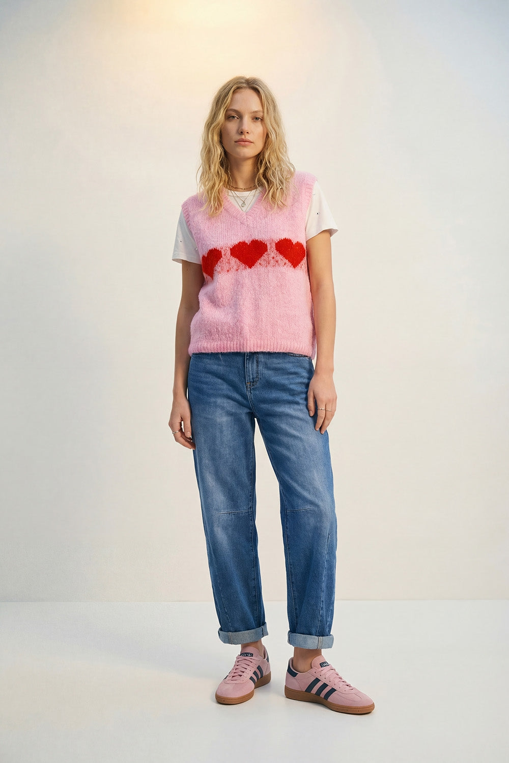 Gilet décontracté en tricot rose duveteux avec motif en forme de cœur