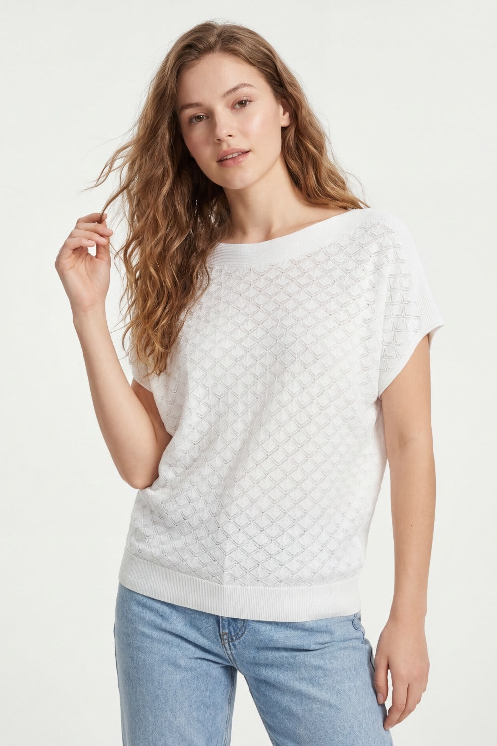 Pull en tricot texturé blanc à motif de diamants