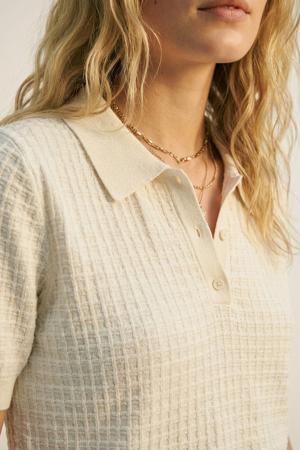 Polo à manches courtes en tricot texturé crème