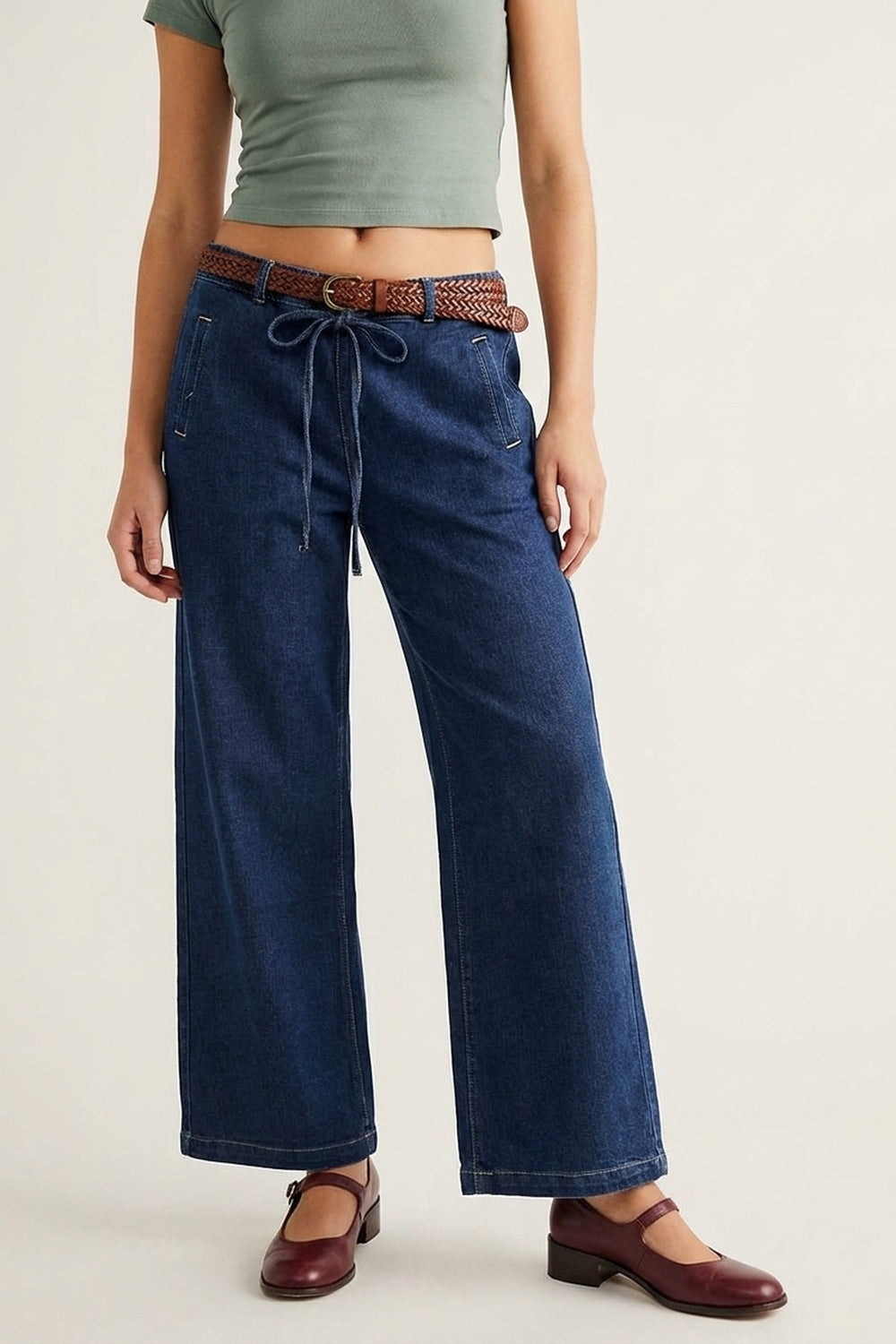 Jeans en denim bleu à jambes larges et à nouer