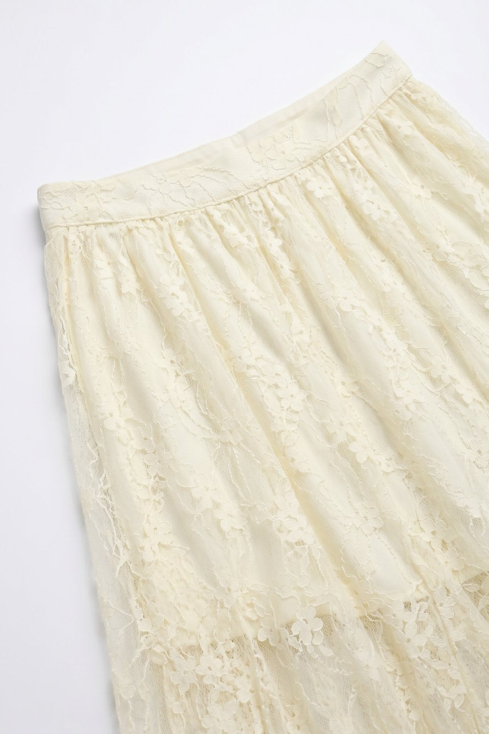 Jupe longue en dentelle florale crème avec taille élastique
