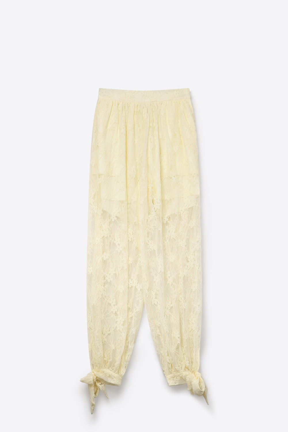 Pantalon de coupe décontractée en dentelle florale crème à ourlet transparent