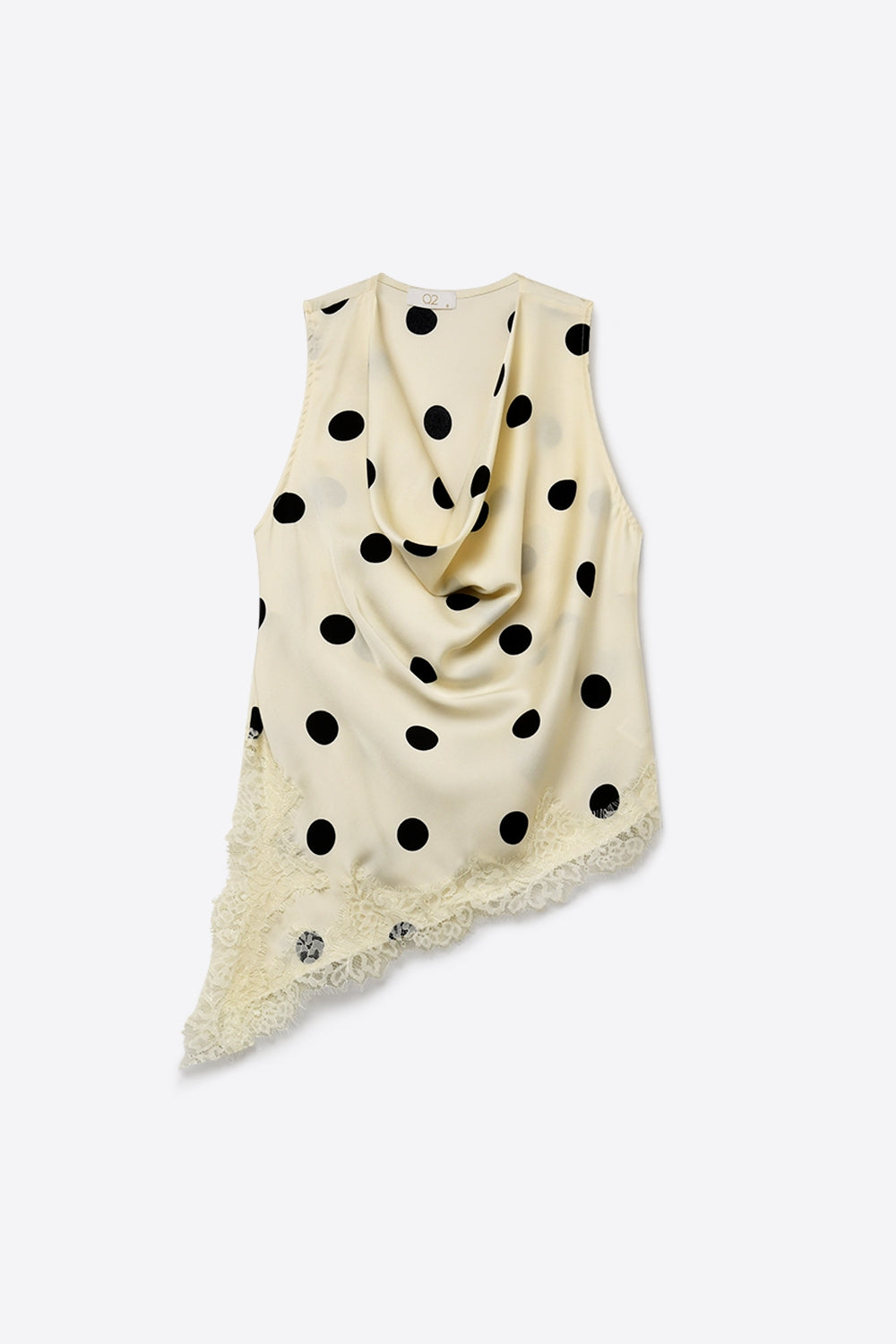 Top asymétrique sans manches en satin à pois crème bordé de dentelle