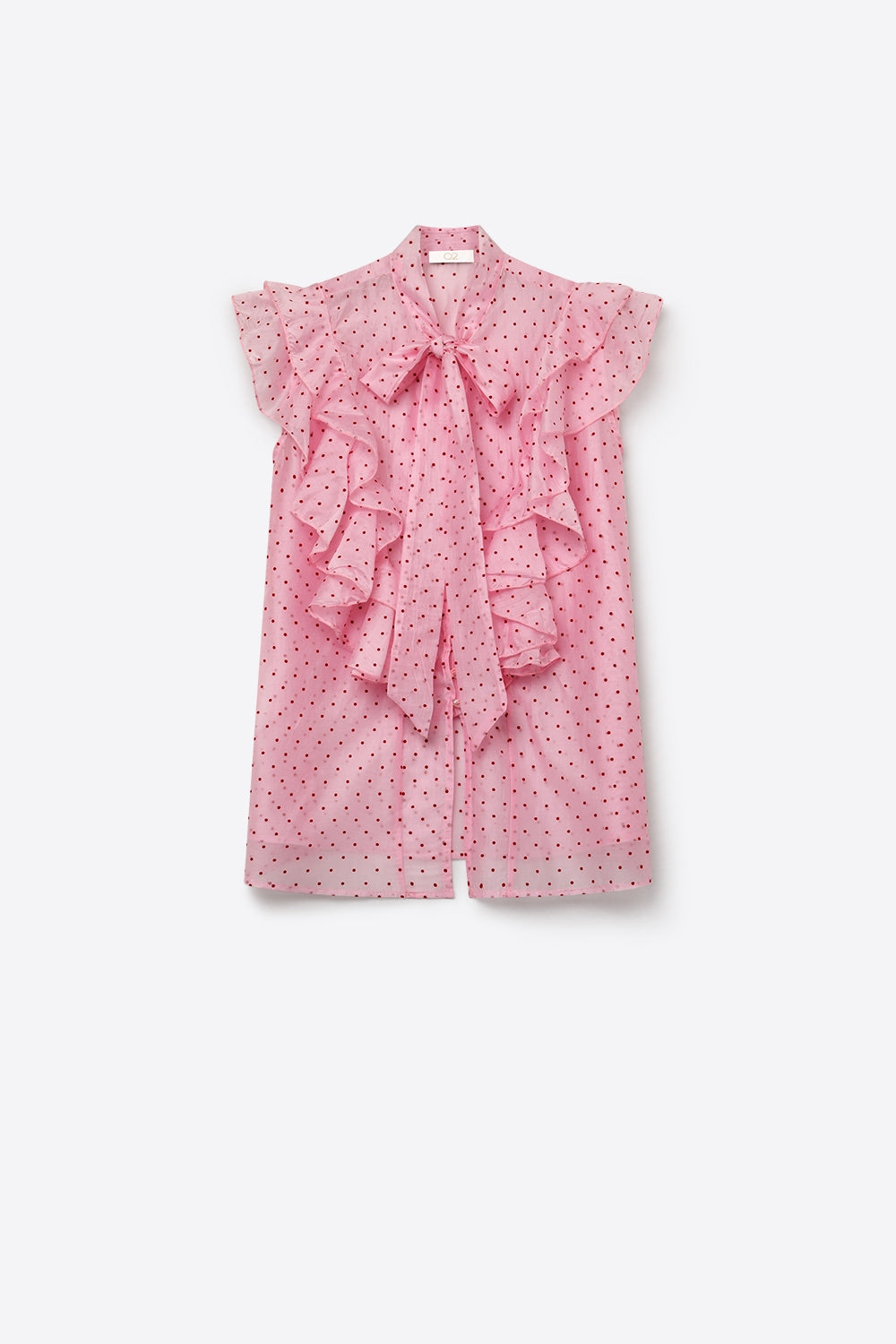 Blouse sans manches en mousseline rose clair à pois avec volants et nœud papillon