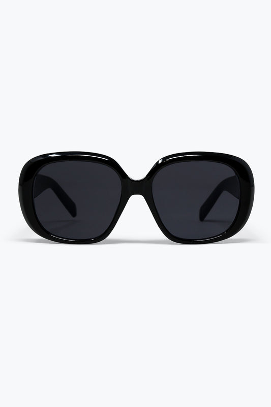 Lunettes de soleil noires surdimensionnées à monture carrée offrant une couverture complète