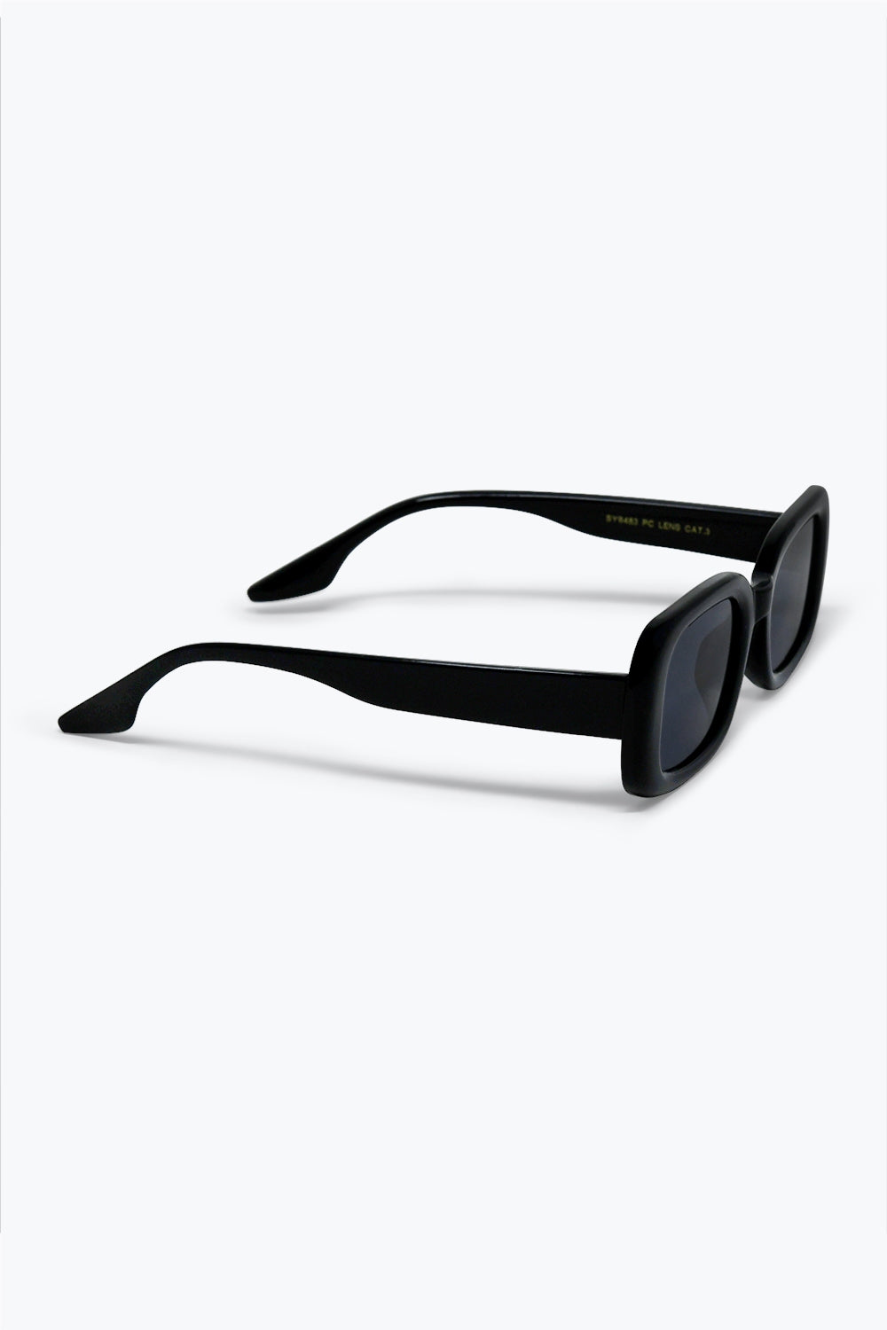 Lunettes de soleil étroites en acétate brillant à monture rectangulaire noire