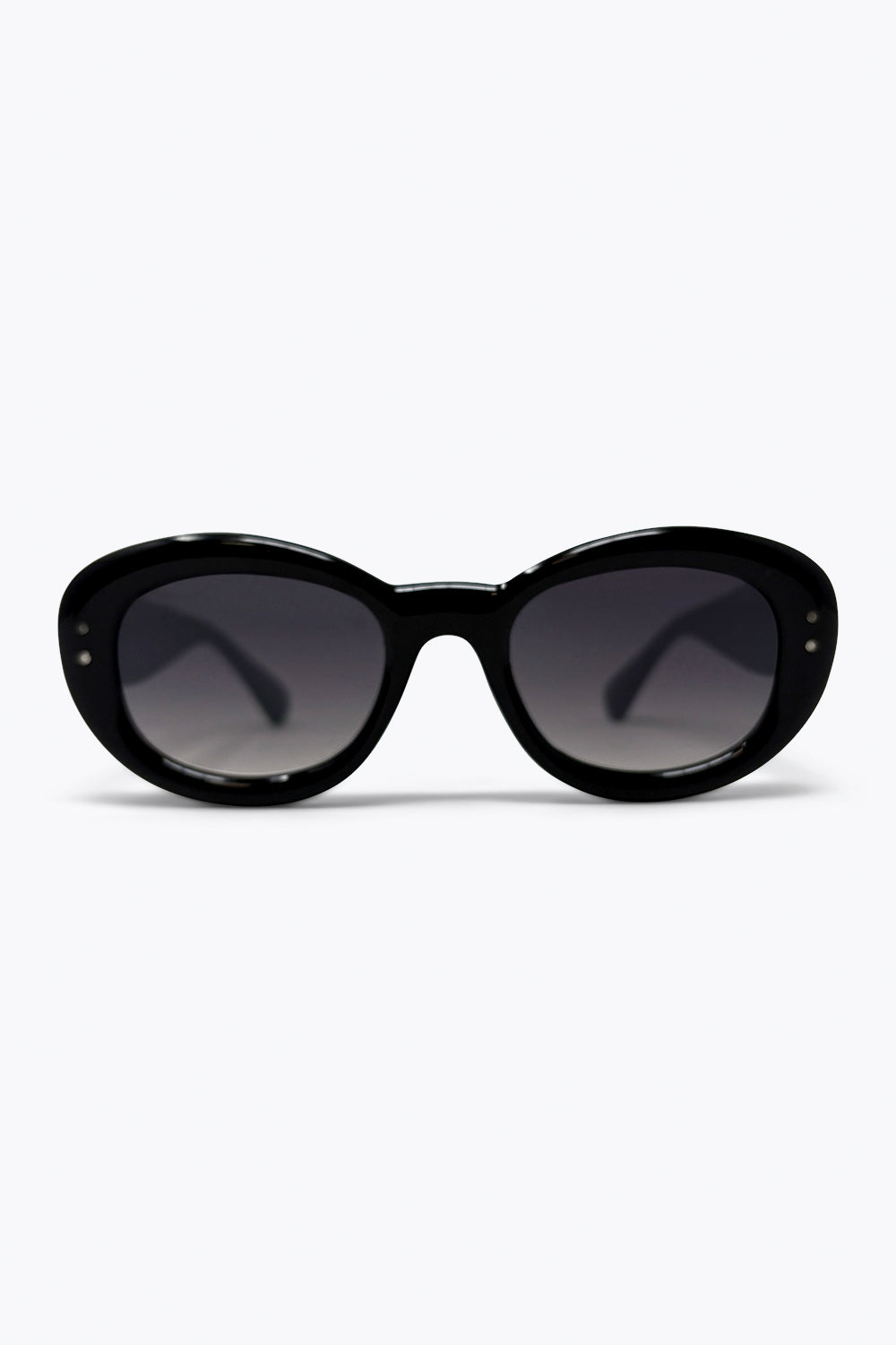 Lunettes de soleil épaisses avec monture ovale noire et verres dégradés