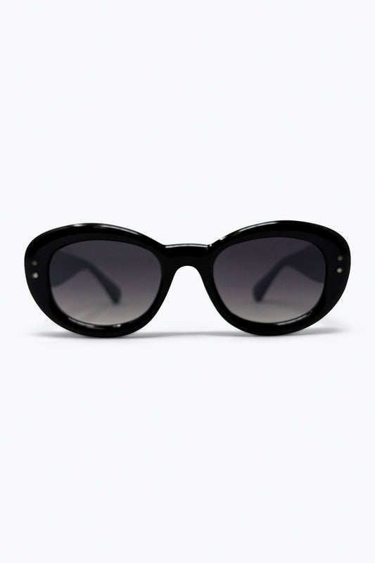 Lunettes de soleil épaisses avec monture ovale noire et verres dégradés