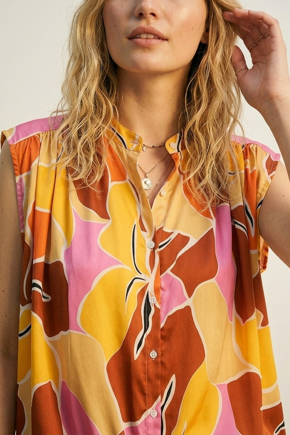 Blouse sans manches à imprimé tropical à boutons en orange tons chauds