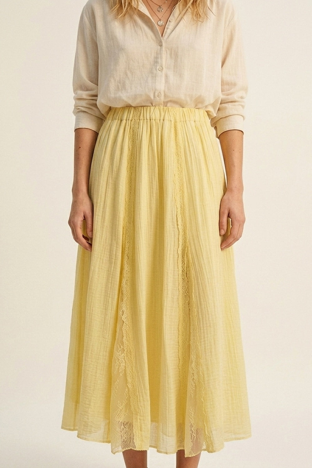 Jupe maxi trapèze jaune en tissu transparent texturé avec insert en dentelle