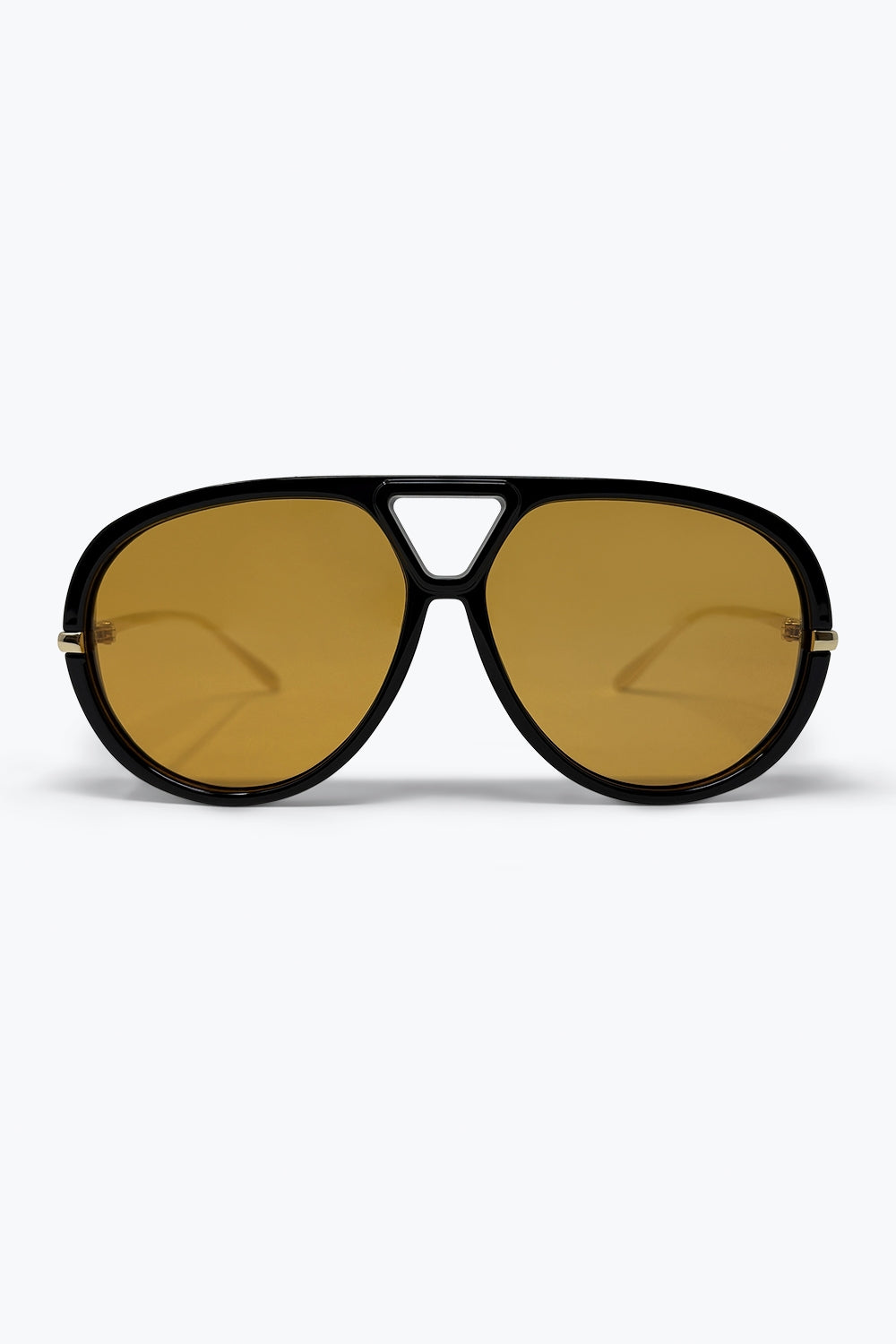 Lunettes de soleil noires à monture aviateur oversize avec bordure dorée et verres ambrés