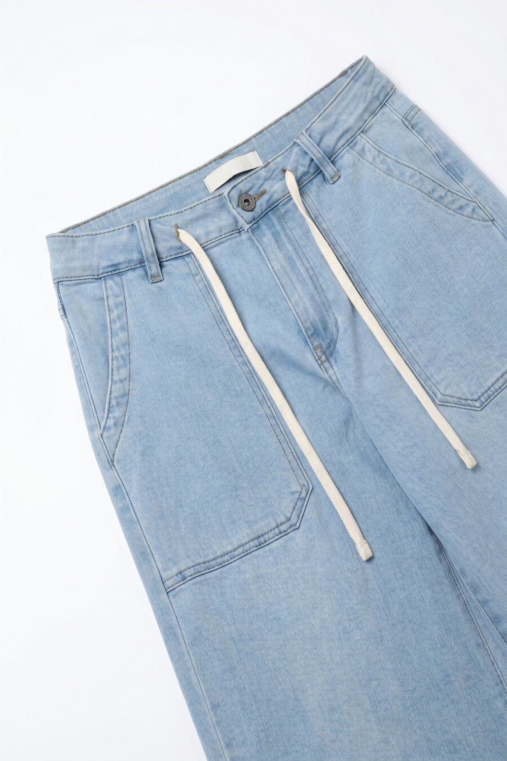Pantalon en denim bleu clair à jambes larges avec taille à cordon