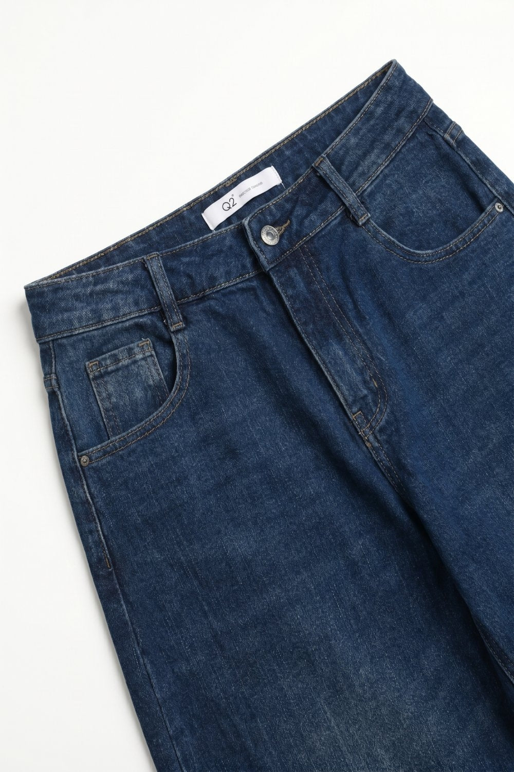 Jean à revers bleu foncé avec style jambe large en tonneau