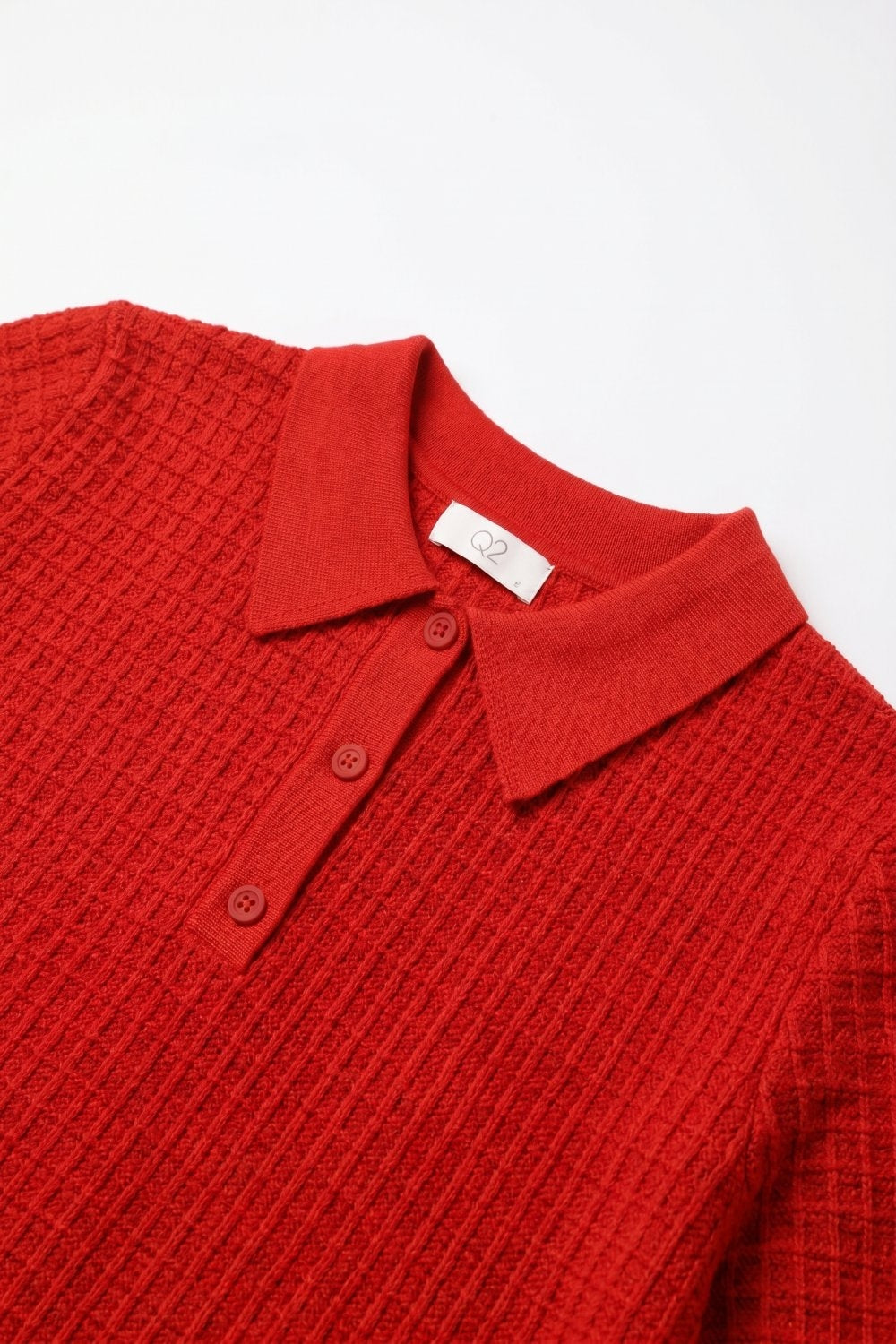 Polo à patte de boutonnage en maille gaufrée rouge à manches courtes