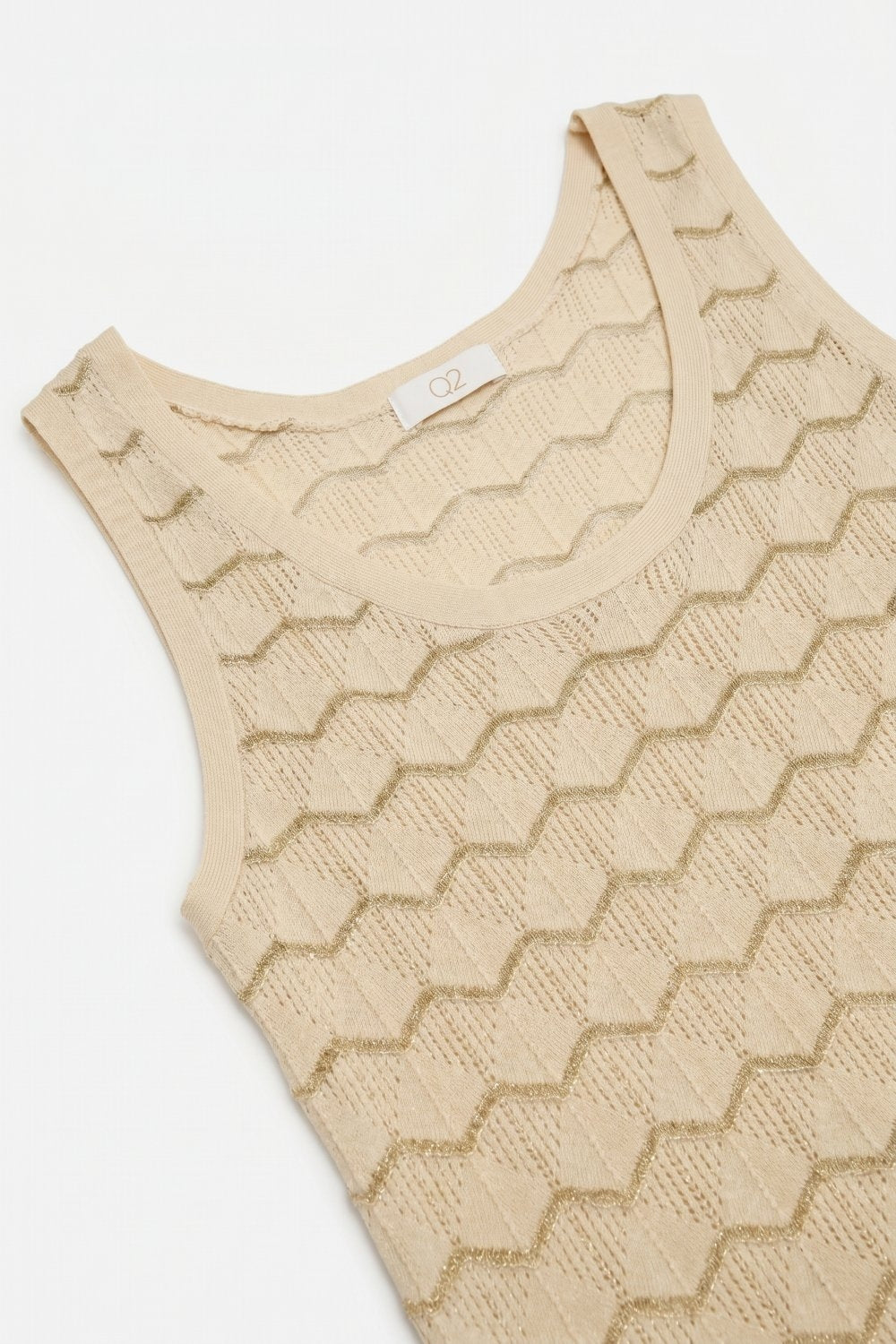 top sans manches texturé beige en maille géométrique