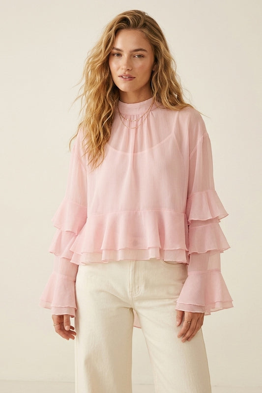 Chemisier asymétrique à col montant et volants en mousseline rose clair
