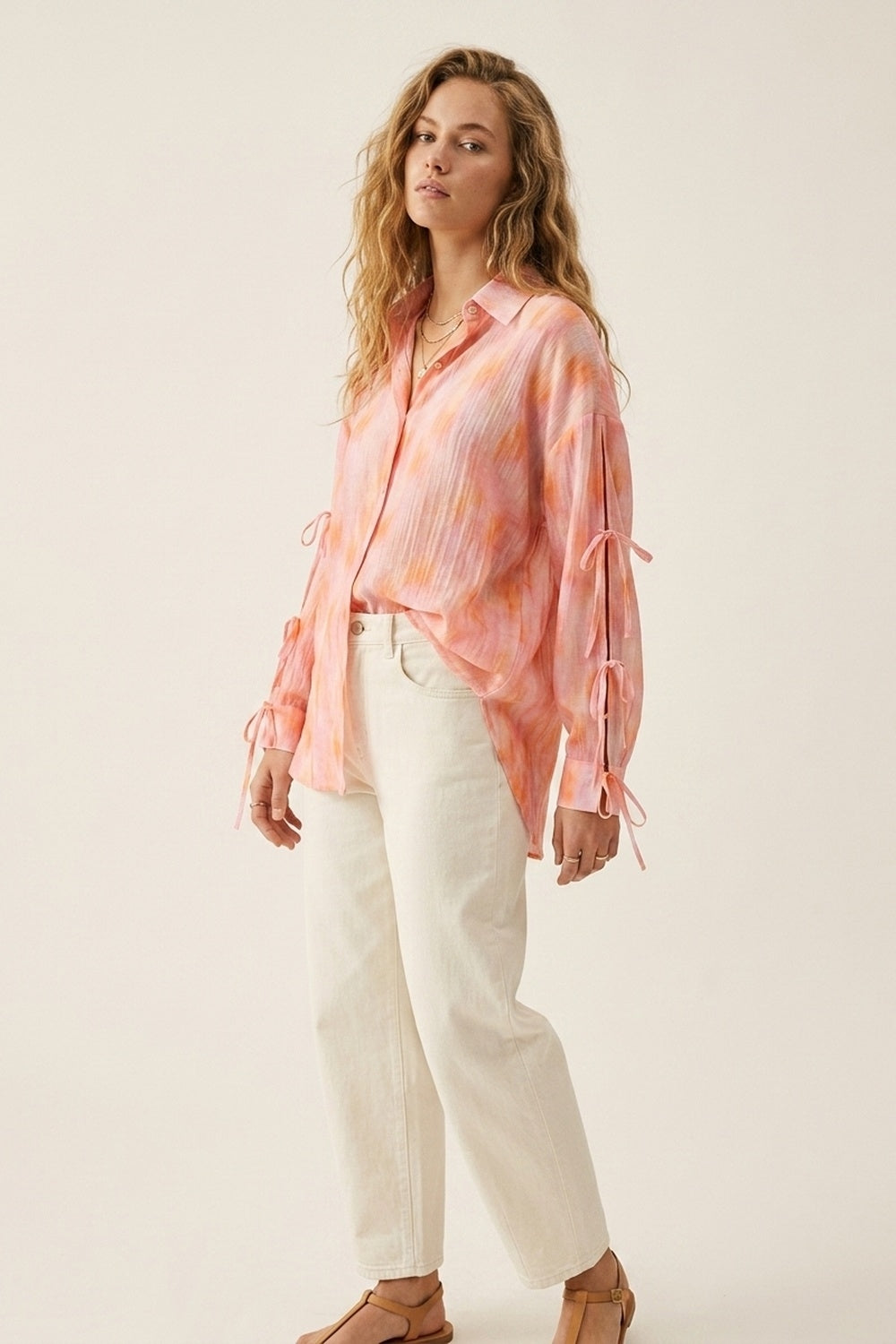 Chemise à boutons surdimensionnée rose avec manches nouées