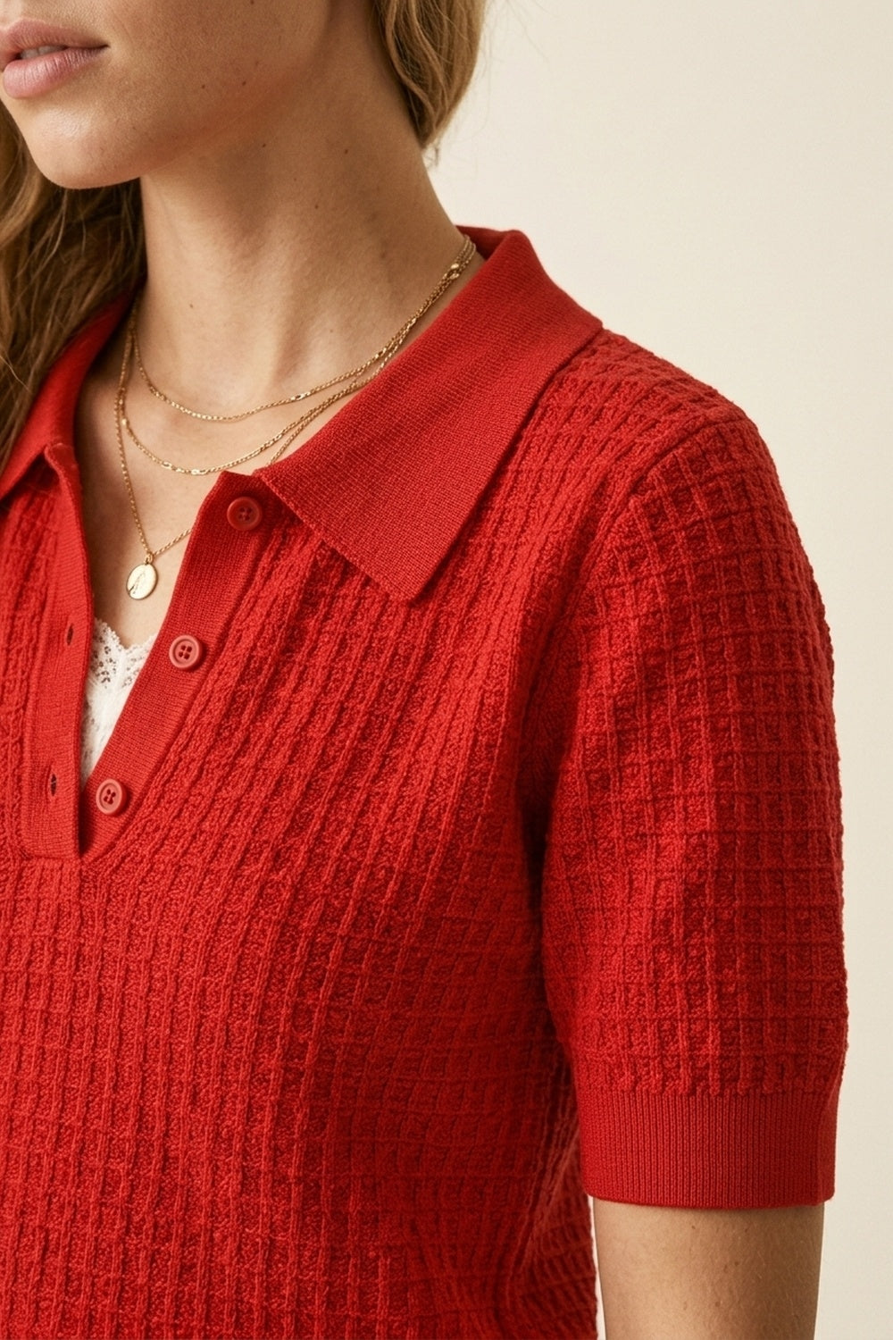 Polo à patte de boutonnage en maille gaufrée rouge à manches courtes