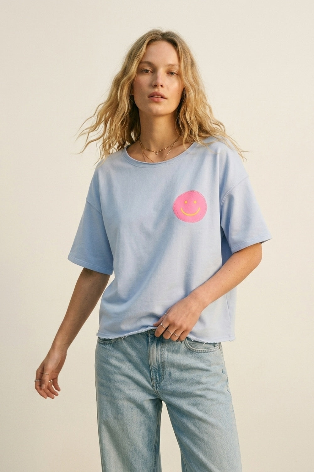 Sweat-shirt bleu clair coupe décontractée avec Smiley rose