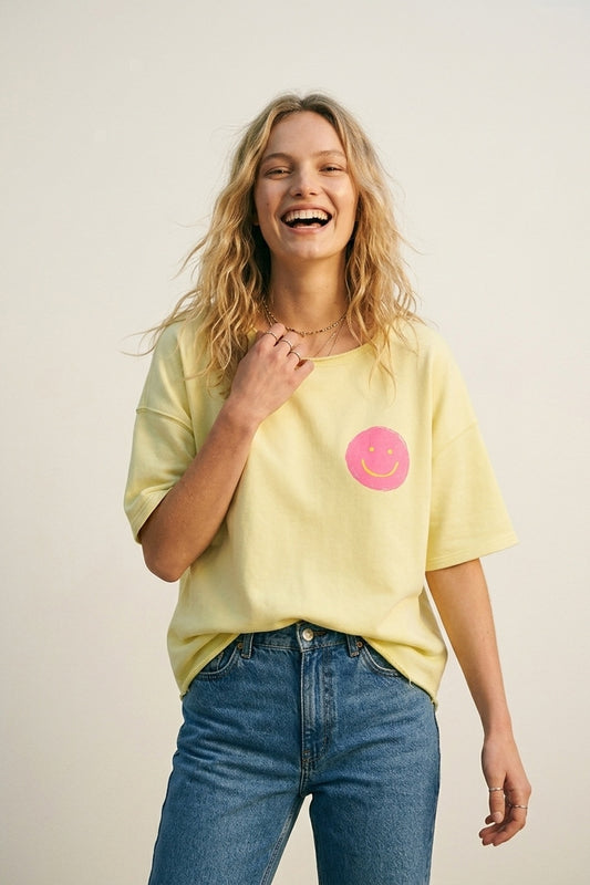 Sweat-shirt en coton jaune coupe décontractée avec écusson sourire