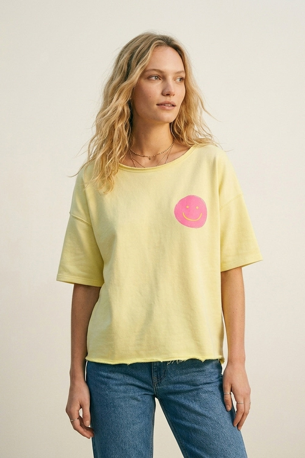 Sweat-shirt en coton jaune coupe décontractée avec écusson sourire