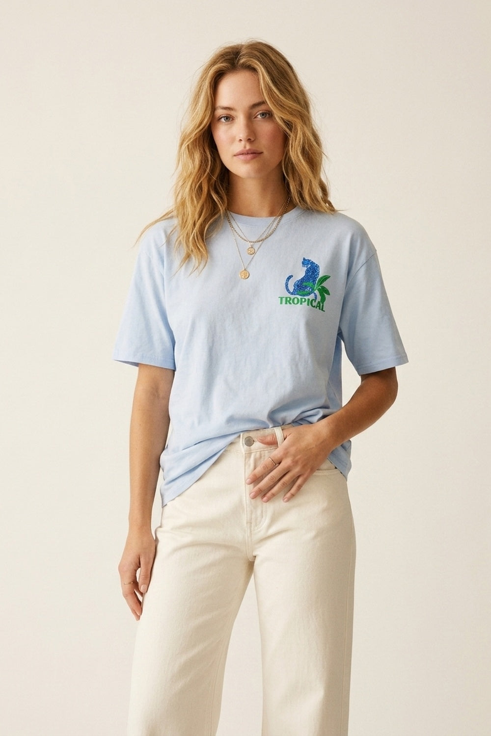 T-shirt bleu fabriqué en Italie avec imprimé graphique tropical
