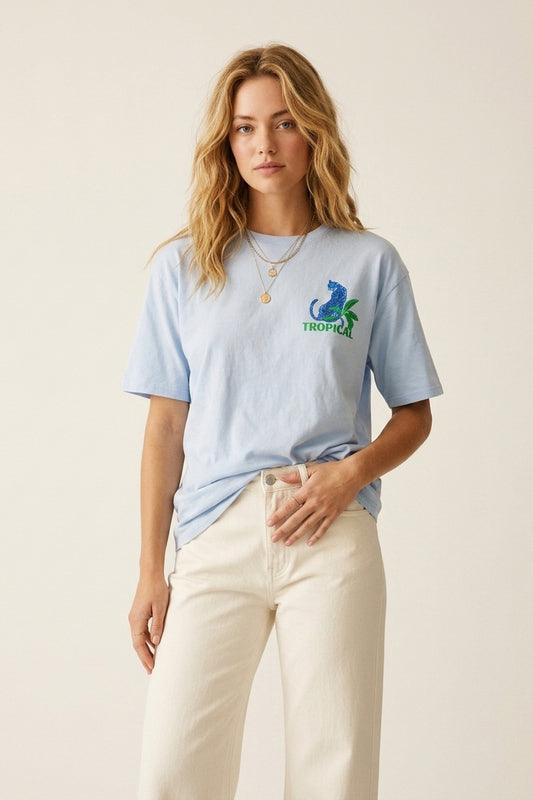 T-shirt bleu fabriqué en Italie avec imprimé graphique tropical