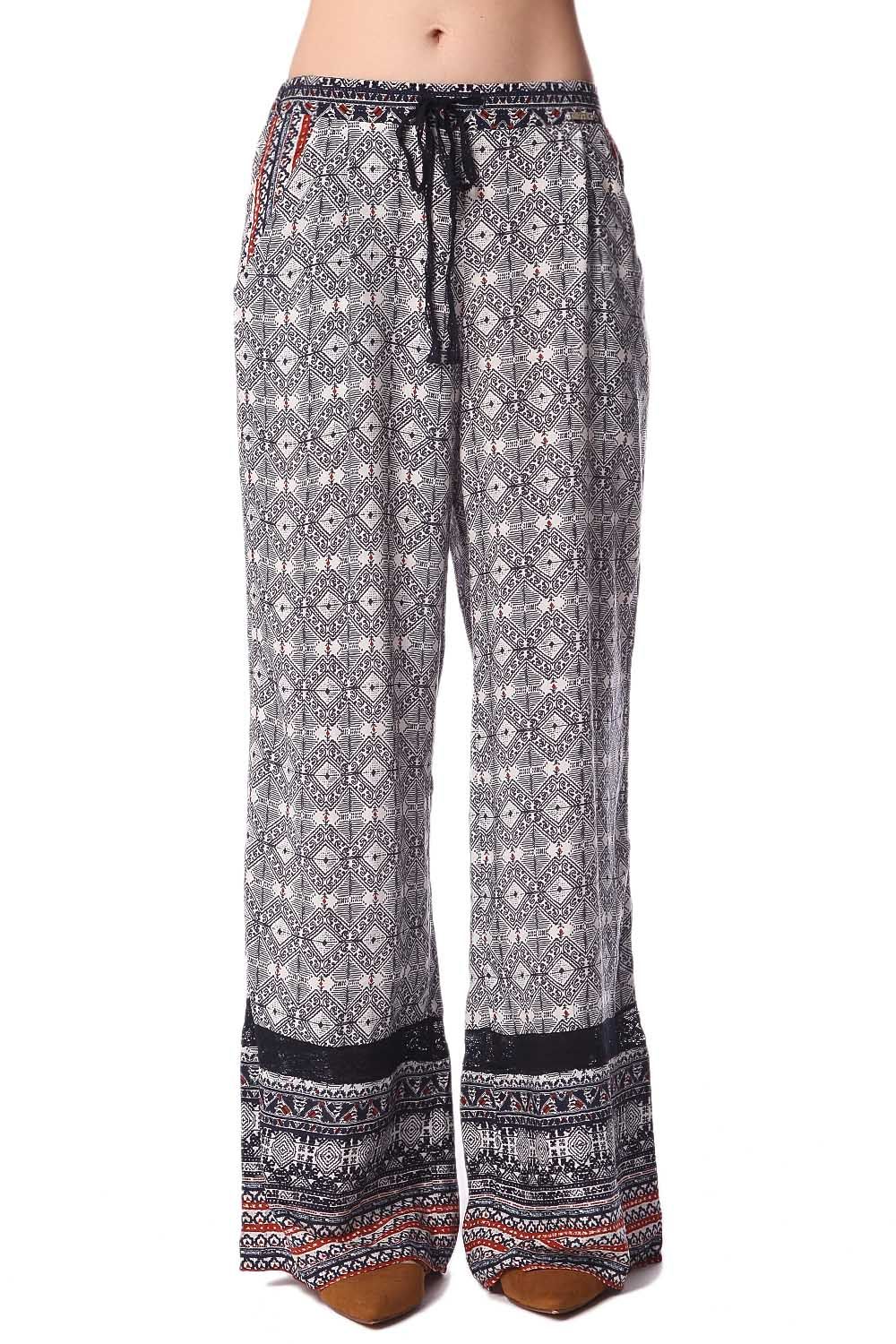 Pantalon large bleu à imprimé ethnique et insert en dentelle frangée