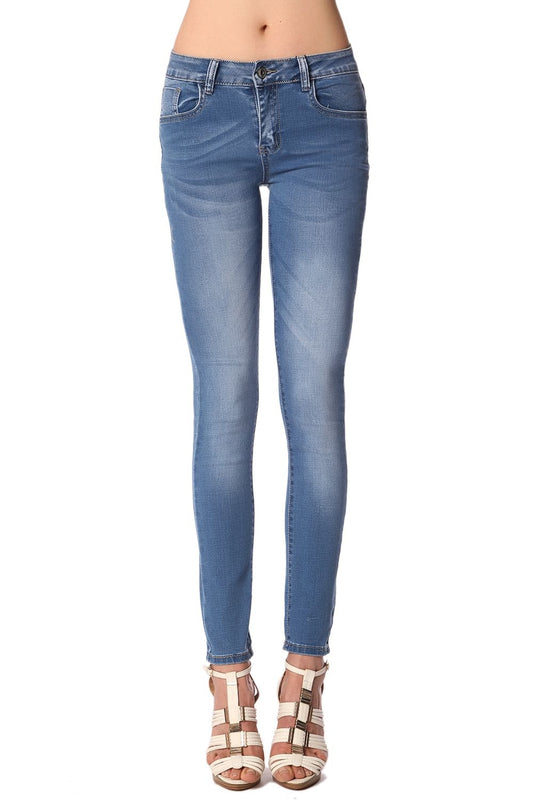 Jean skinny taille mi-haute et délavage clair