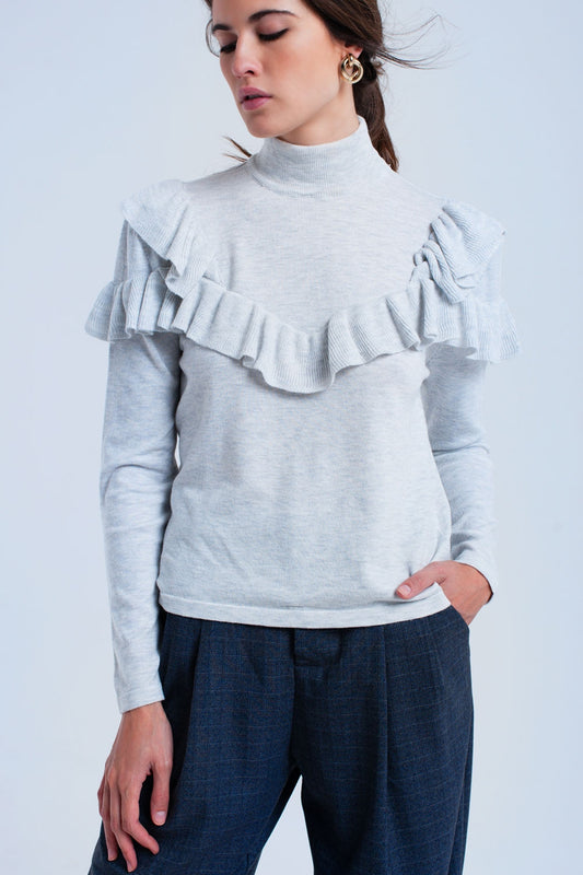 Pull gris avec volants