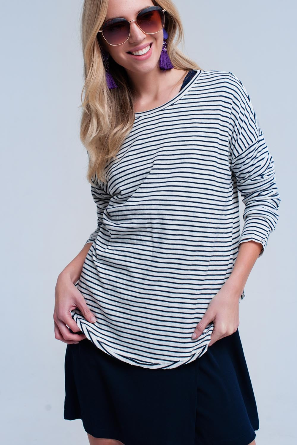 Pull asymétrique rayé bleu