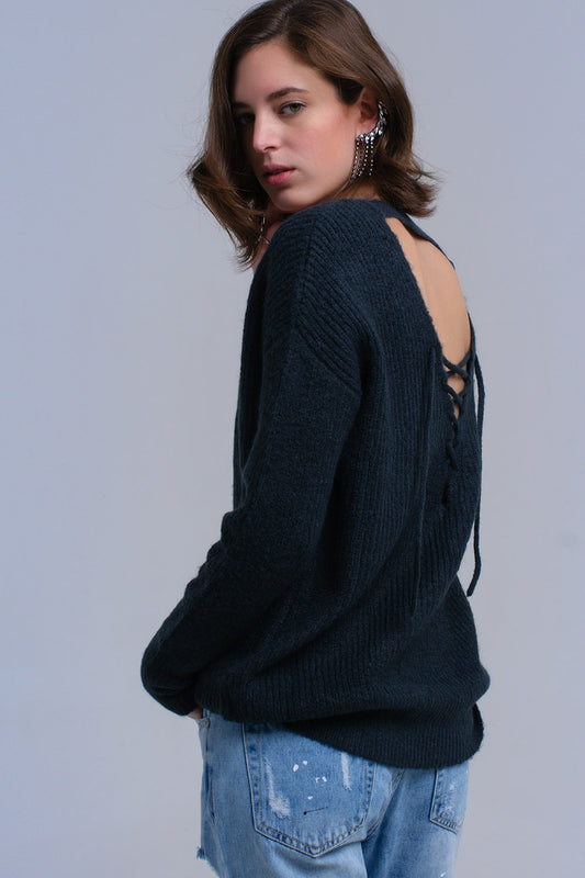 Pull en maille vert avec fermeture à nouer