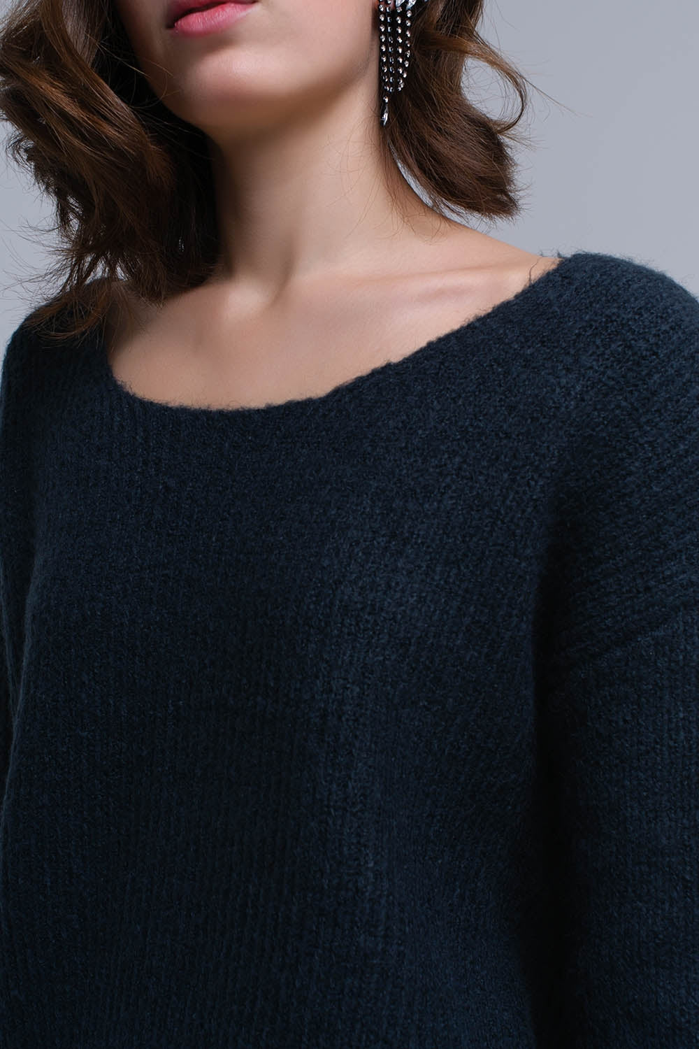 Pull en maille vert avec fermeture à nouer