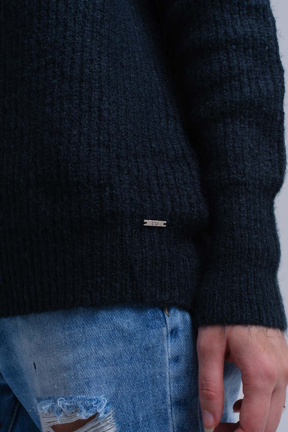 Pull en maille vert avec fermeture à nouer