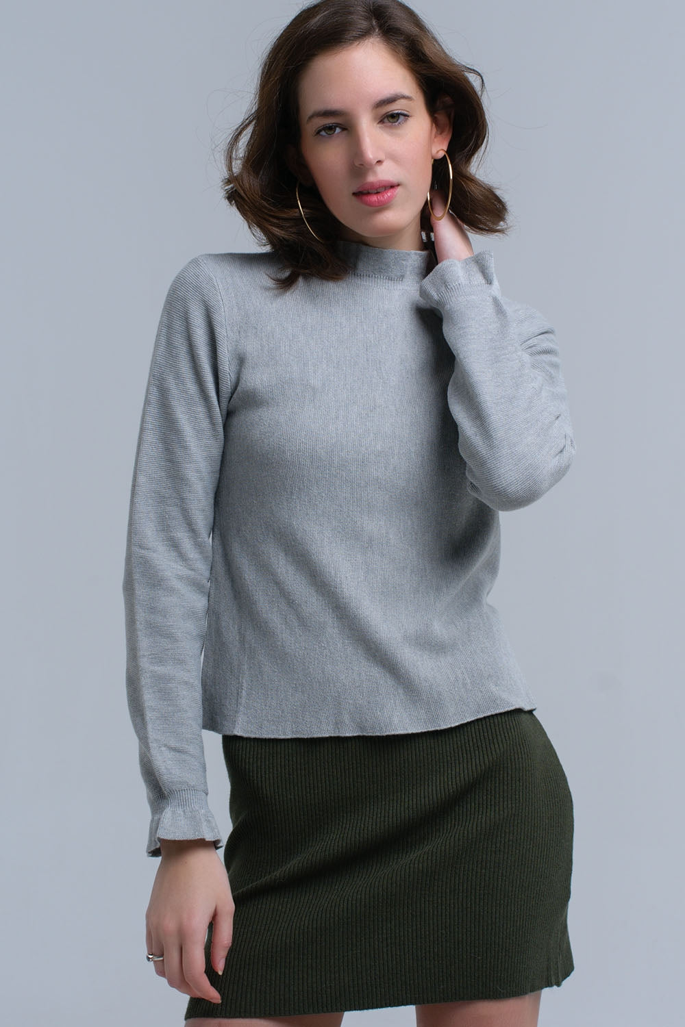 Pull à volants en gris