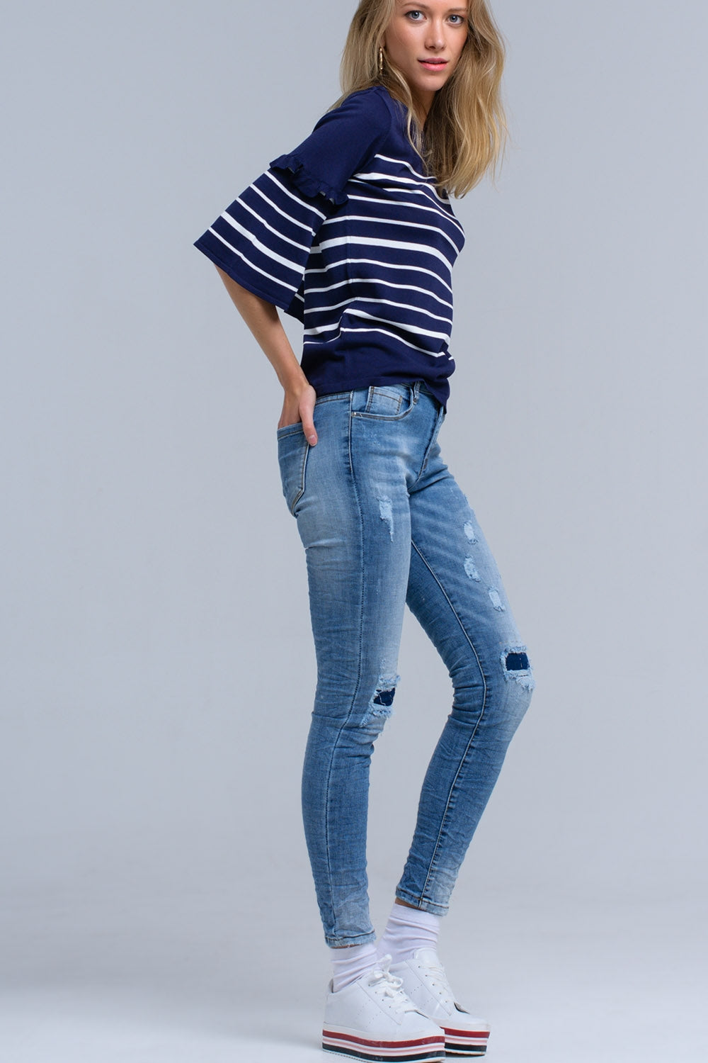 Jeans skinny avec déchirures