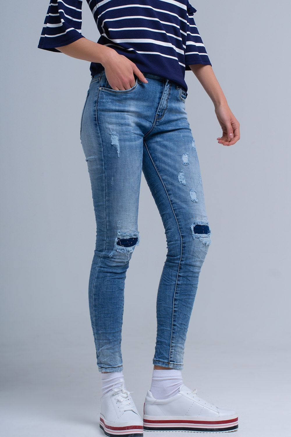 Jeans skinny avec déchirures