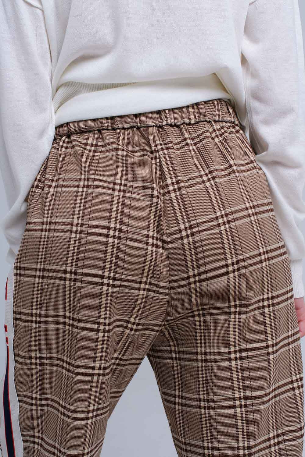 Pantalon à motif tartan marron