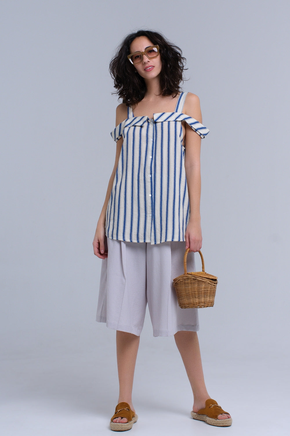 Top crème à rayures bleues
