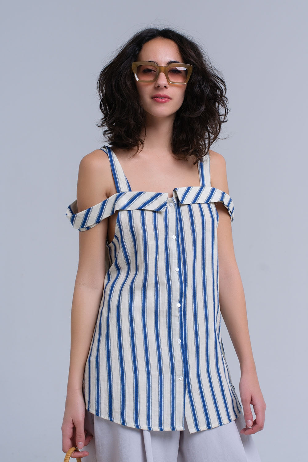Top crème à rayures bleues