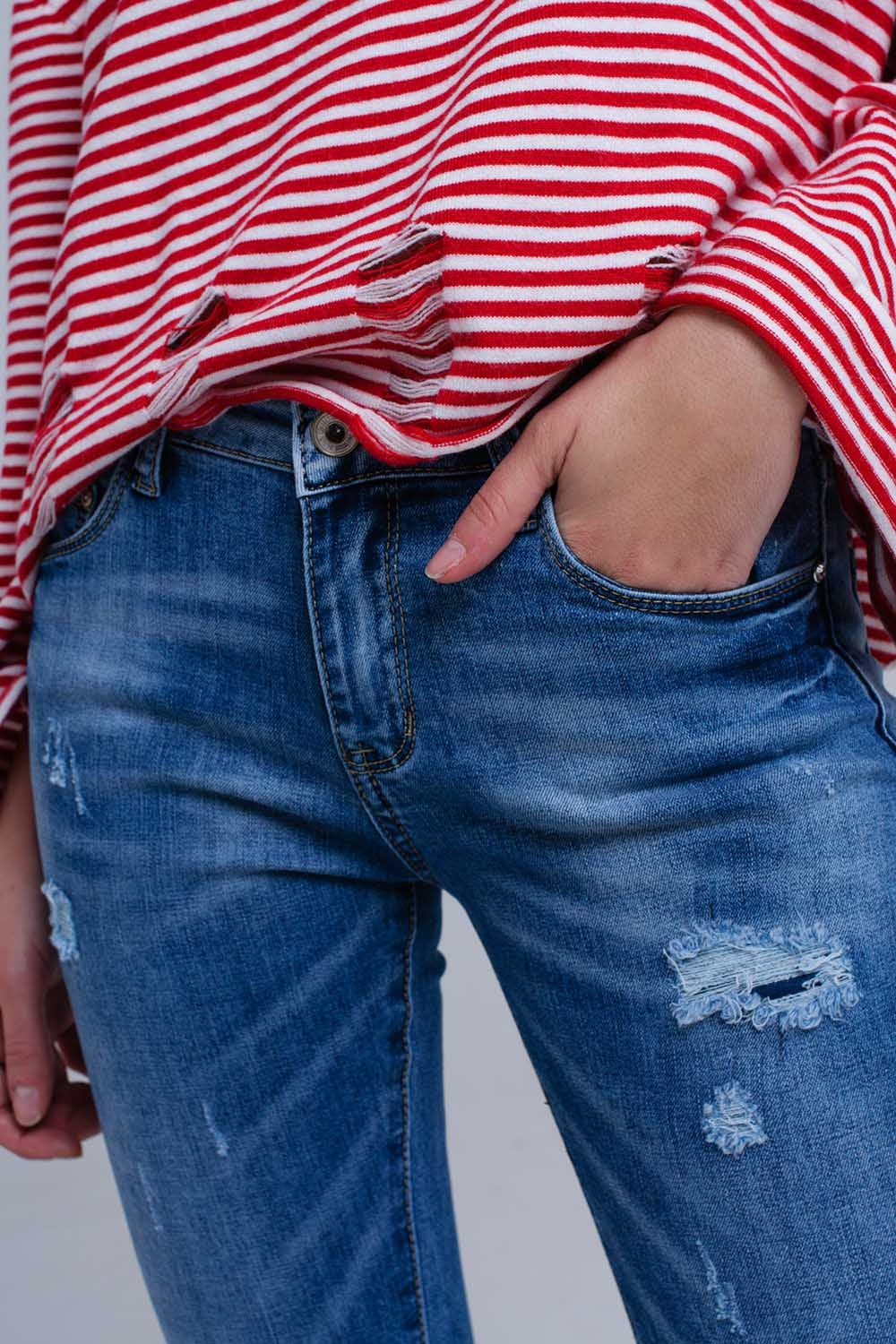 Jean skinny vieilli avec franges
