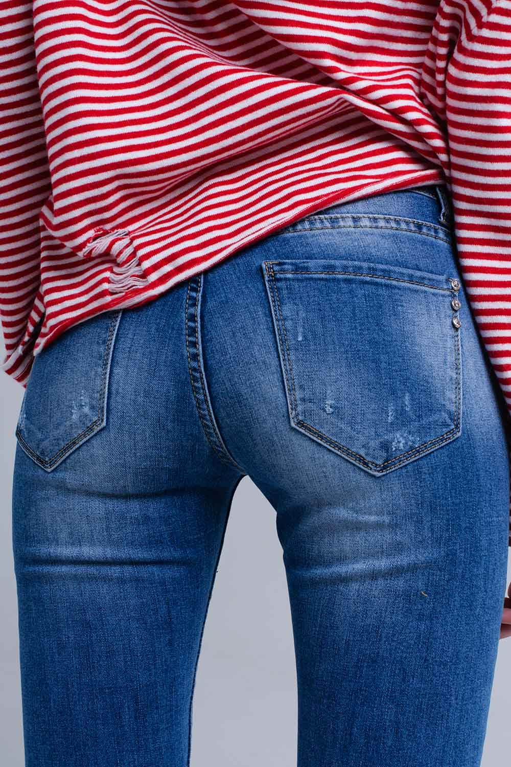 Jean skinny vieilli avec franges