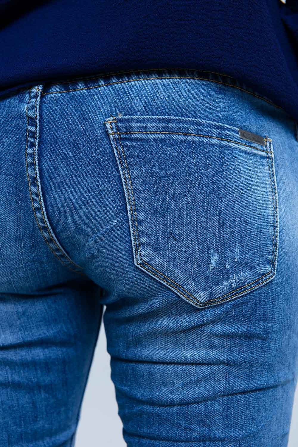 Jeans avec détails déchirés