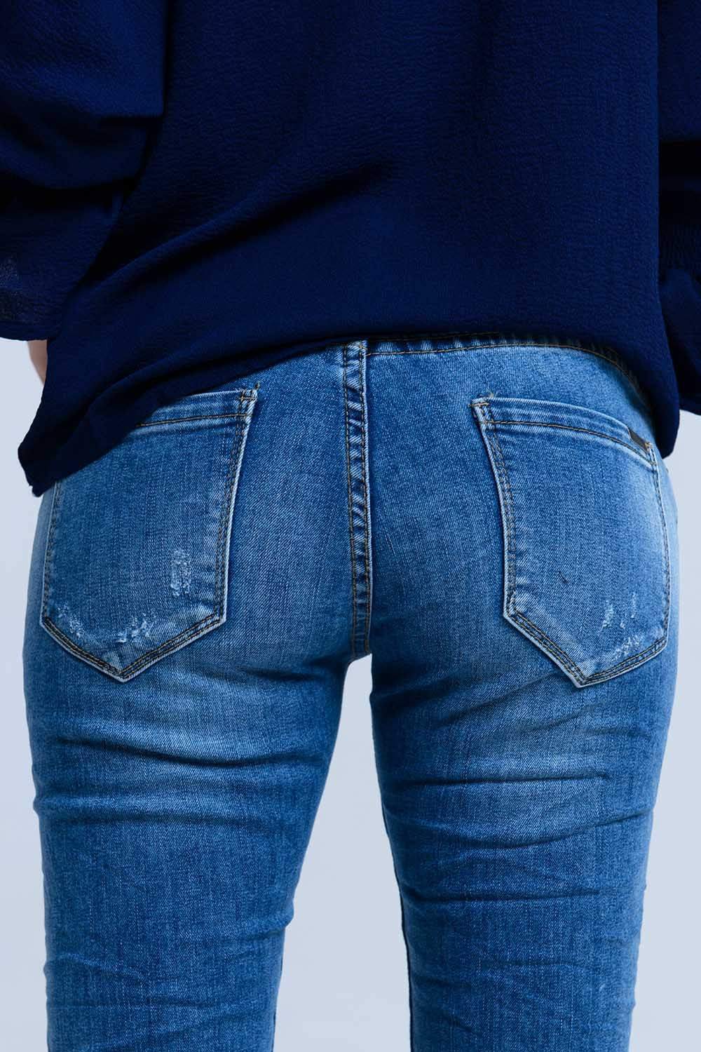 Jeans avec détails déchirés