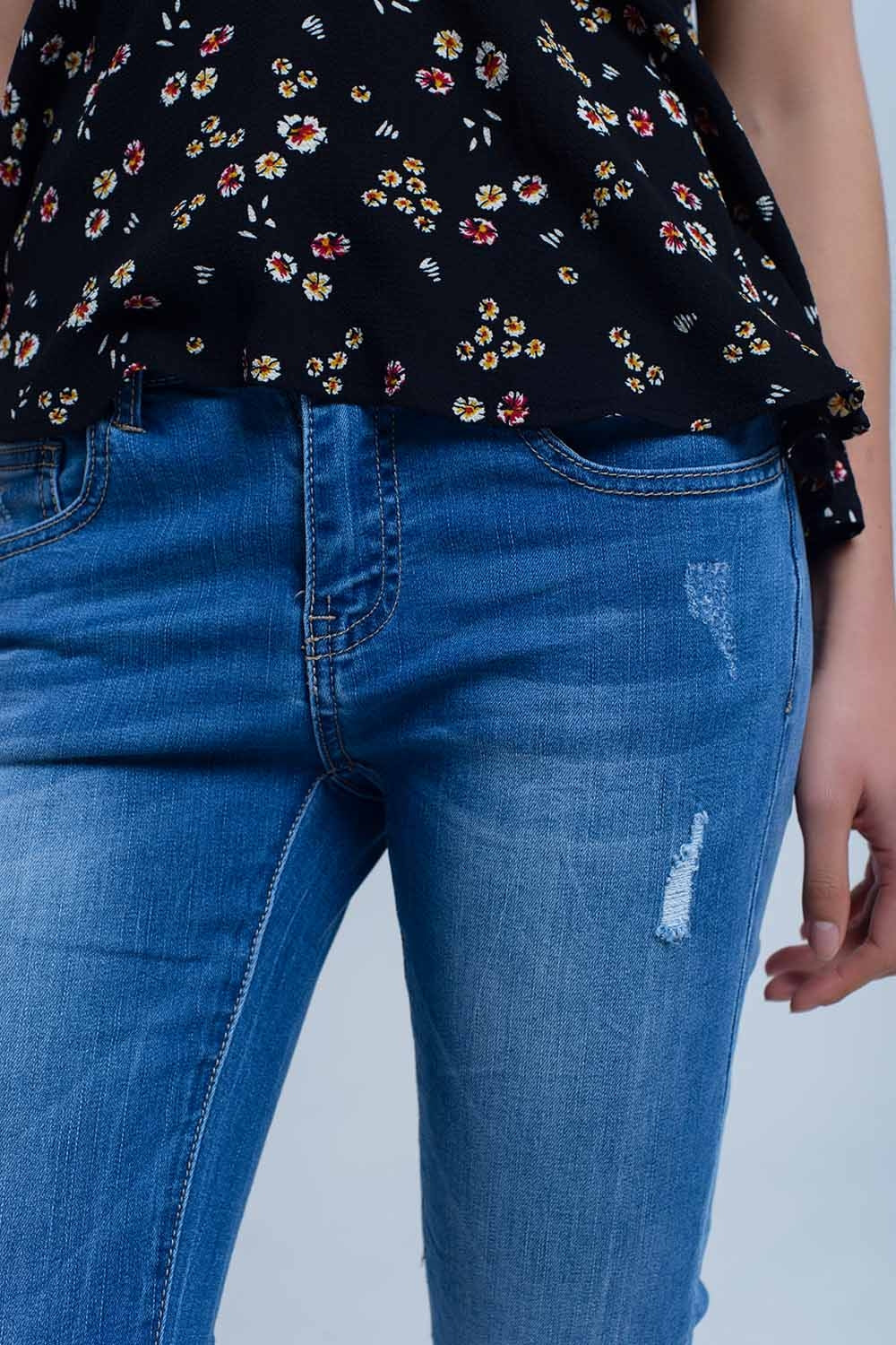 Jean skinny avec déchirures au genou
