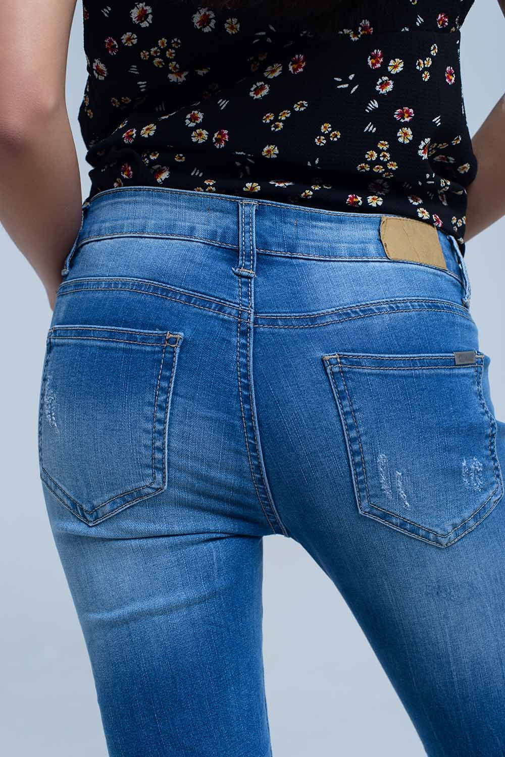 Jean skinny avec déchirures au genou
