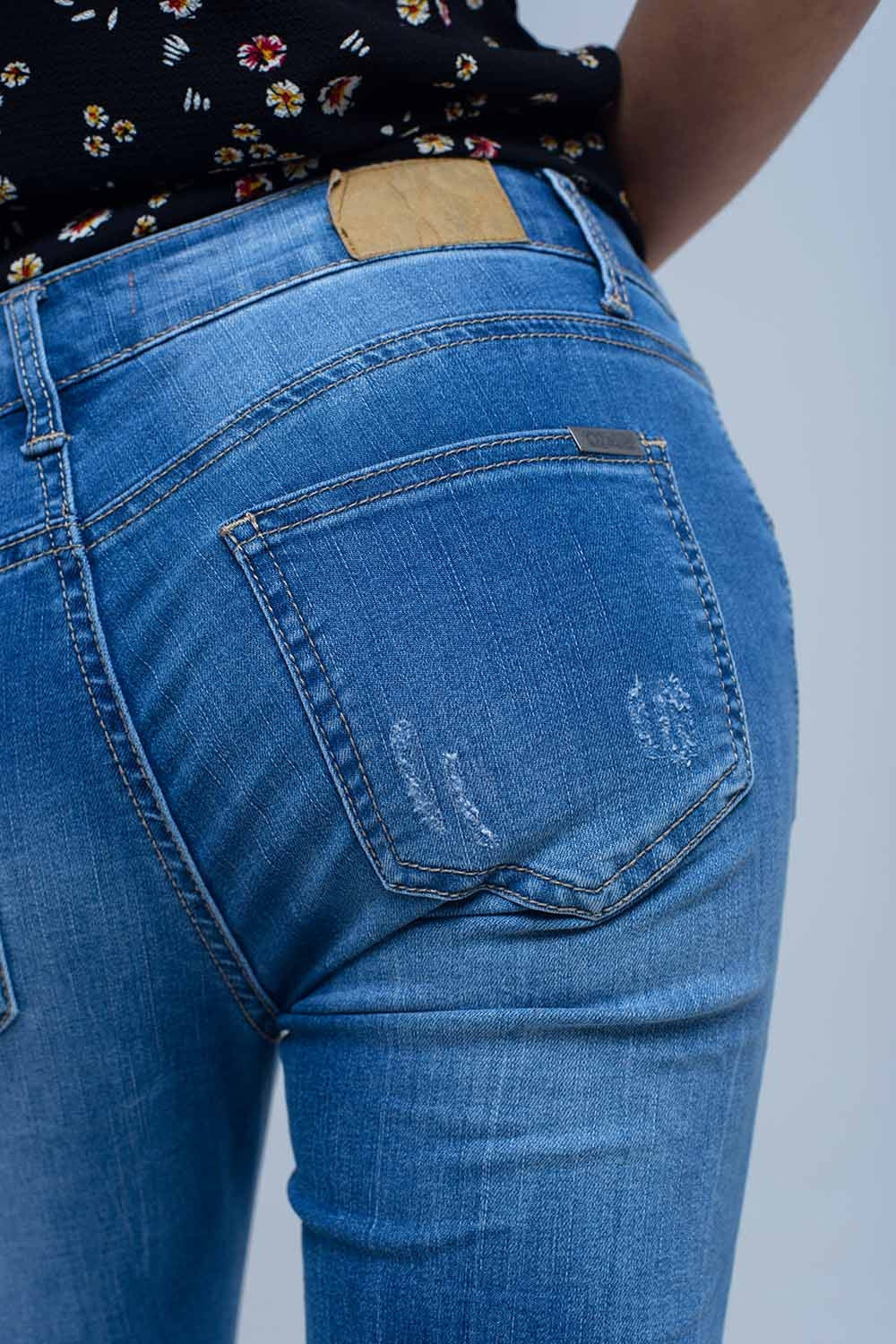 Jean skinny avec déchirures au genou