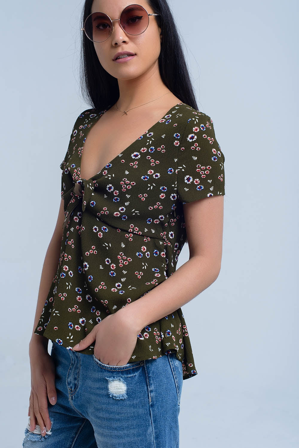 Top vert avec imprimé floral