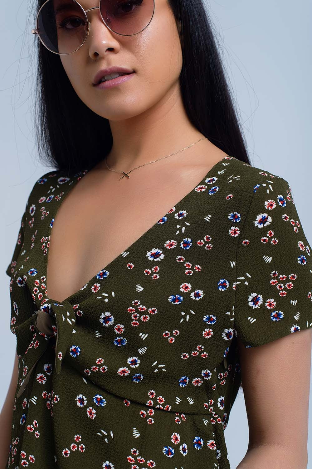 Top vert avec imprimé floral