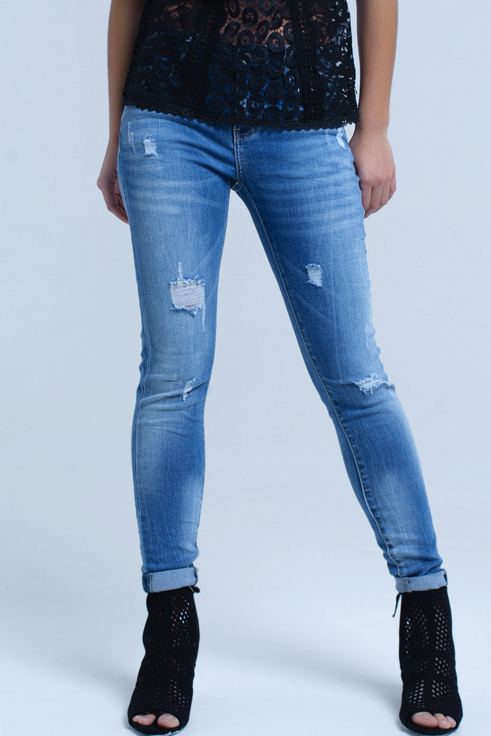 Jeans skinny avec déchirures